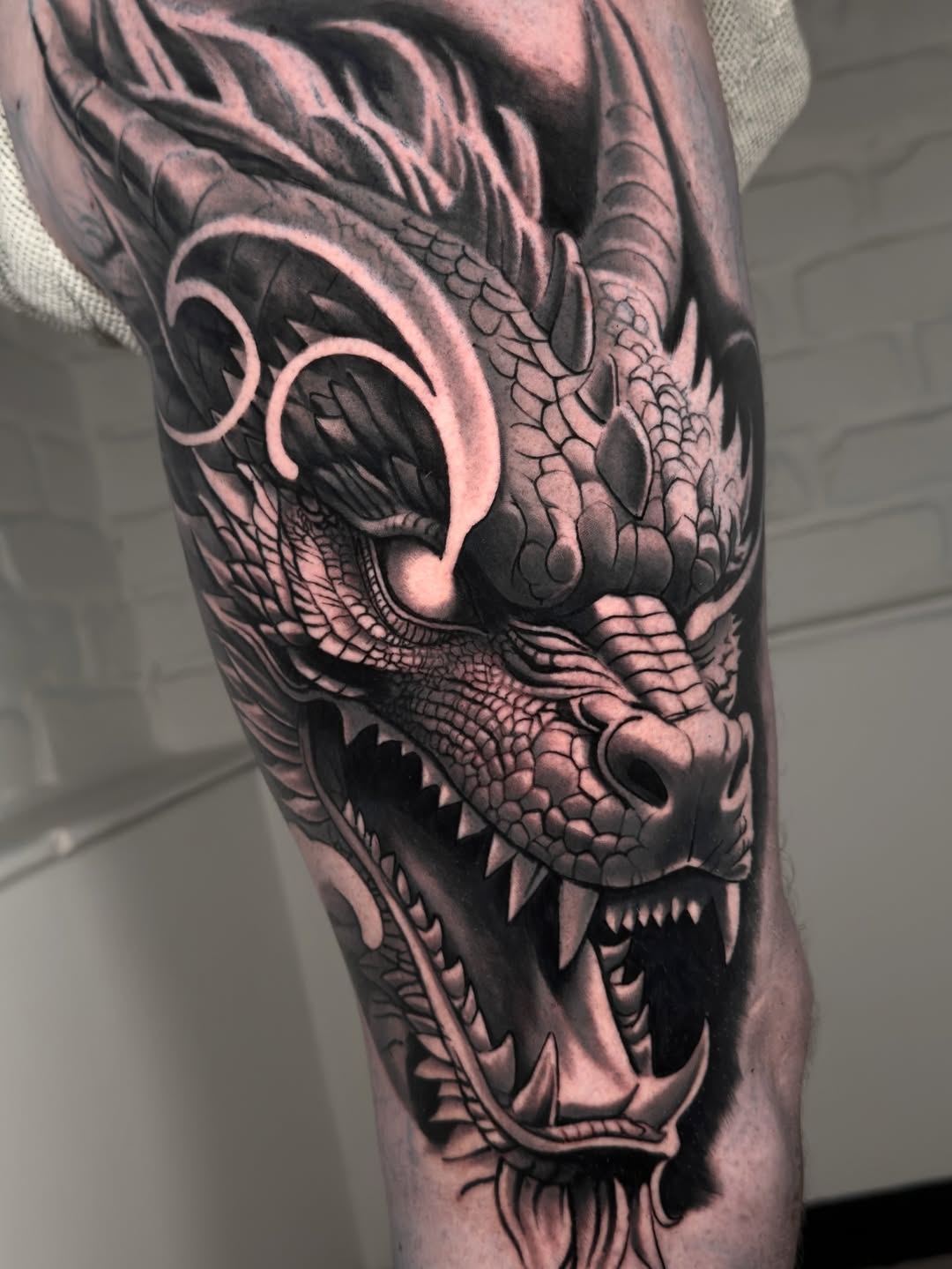 Black & Gray Dragon Tattoos That Wow
