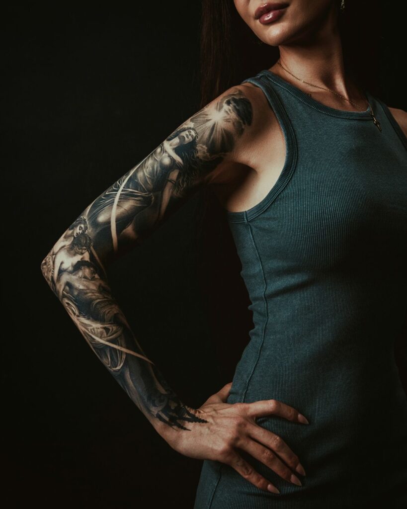 Amelia's black and grey realism religious tattoo sleeve.