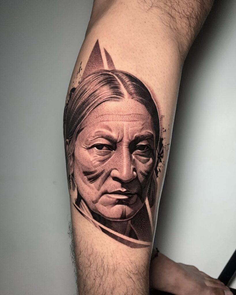 A leg tattoo of a native American man. 