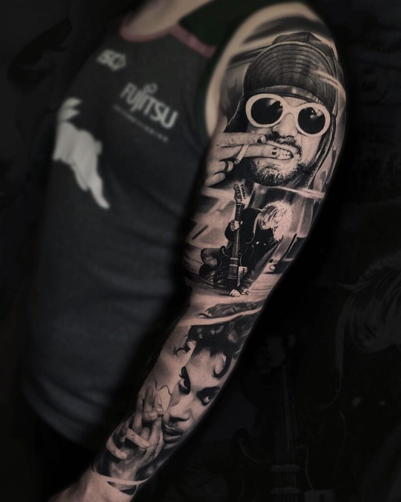 Black and grey realism sleeve showing portraits of musicians Kurt Cobain and Prince
