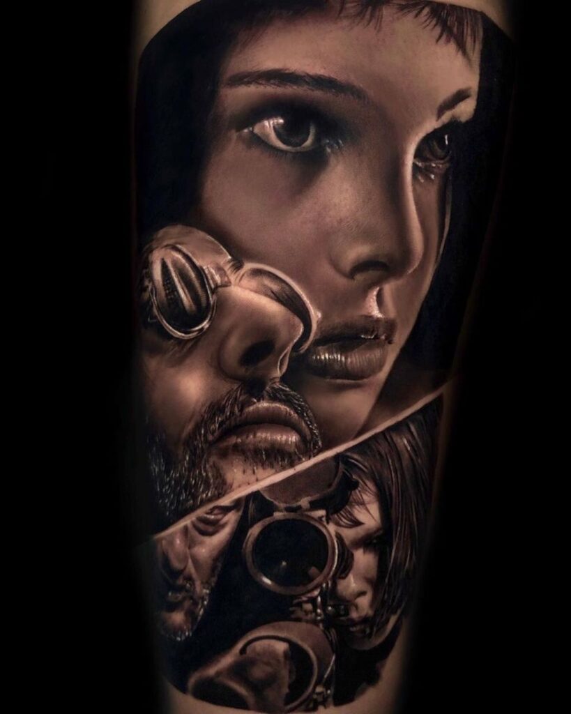 Forearm black and grey realism tattoo depicting the movie Leon. Tattoo shows large portrait of Natalie Portman and Jean Reno alongside a scene from the film. 